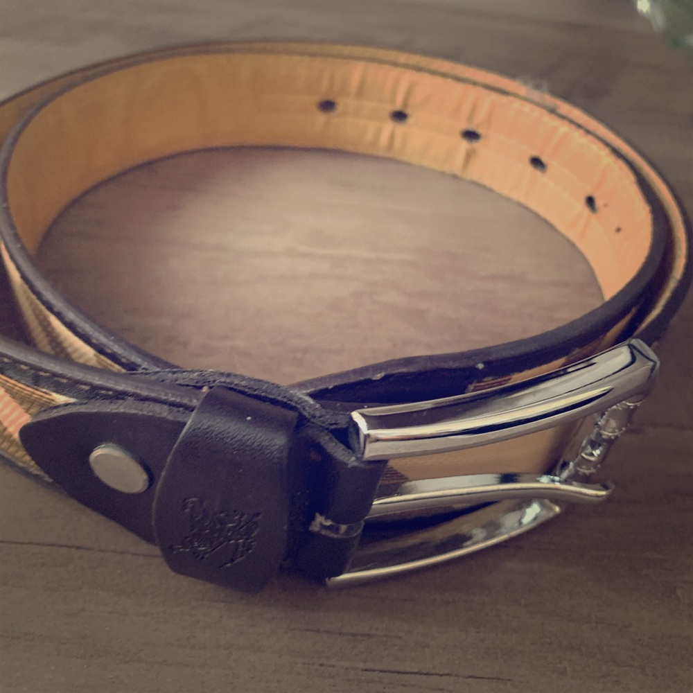 Burberry belt only. Wear and tear.